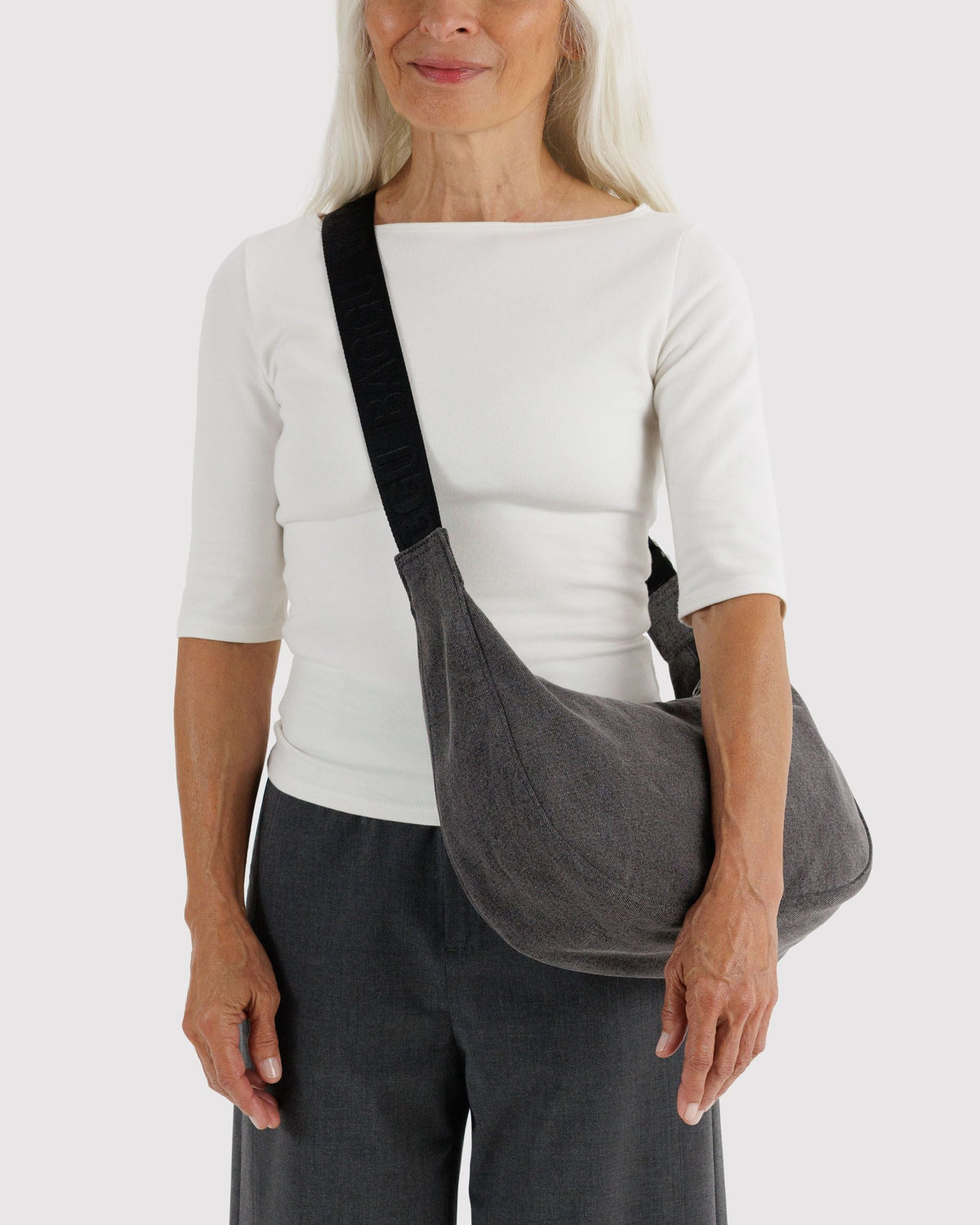 Medium Denim Crescent Bag in Washed Black Denim - Practical Use