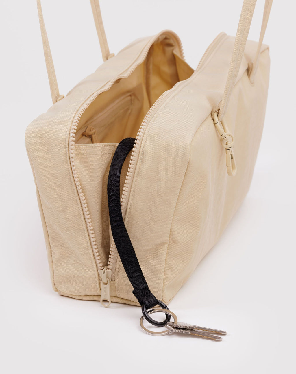 Nylon Bowler Bag in Custard for Comfortable Crossbody Style