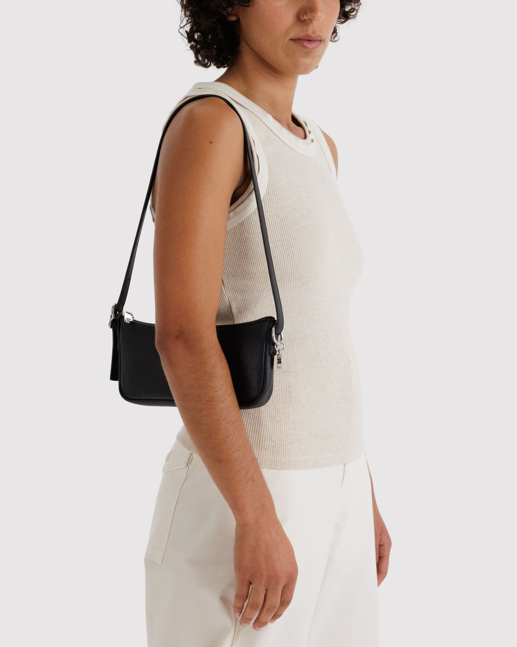 Recycled Leather Pochette in Black for Comfortable Crossbody Style