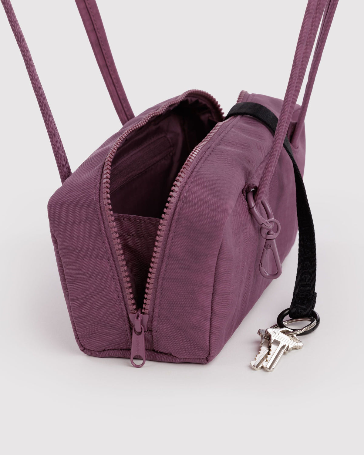 Small Nylon Bowler Bag in Wild Plum for Comfortable Crossbody Style