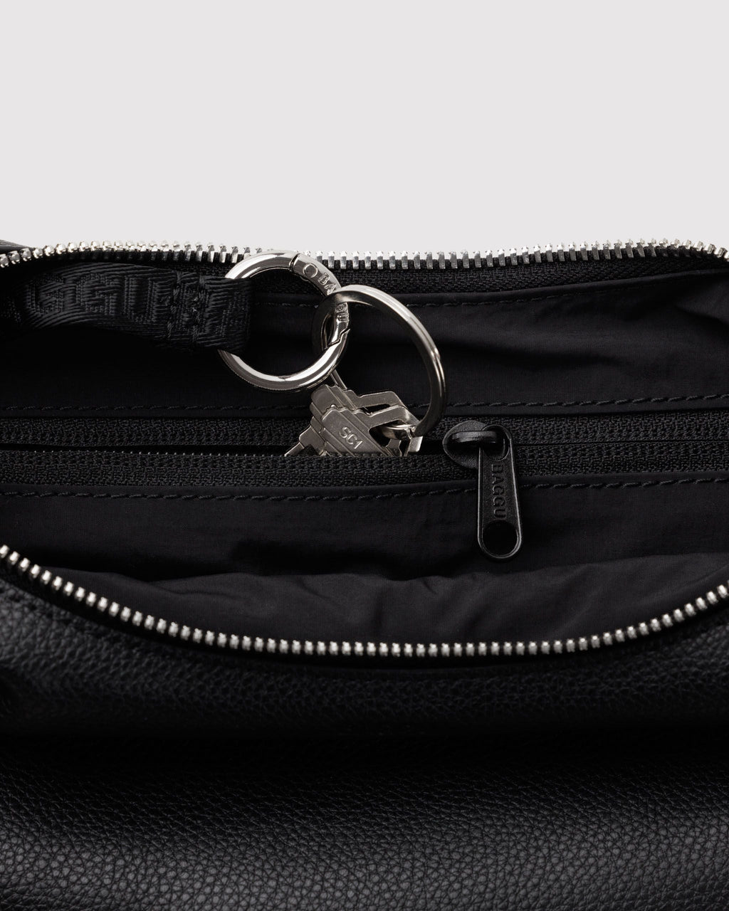 Small Recycled Leather Flat Crescent in Black for Easy Everyday Style
