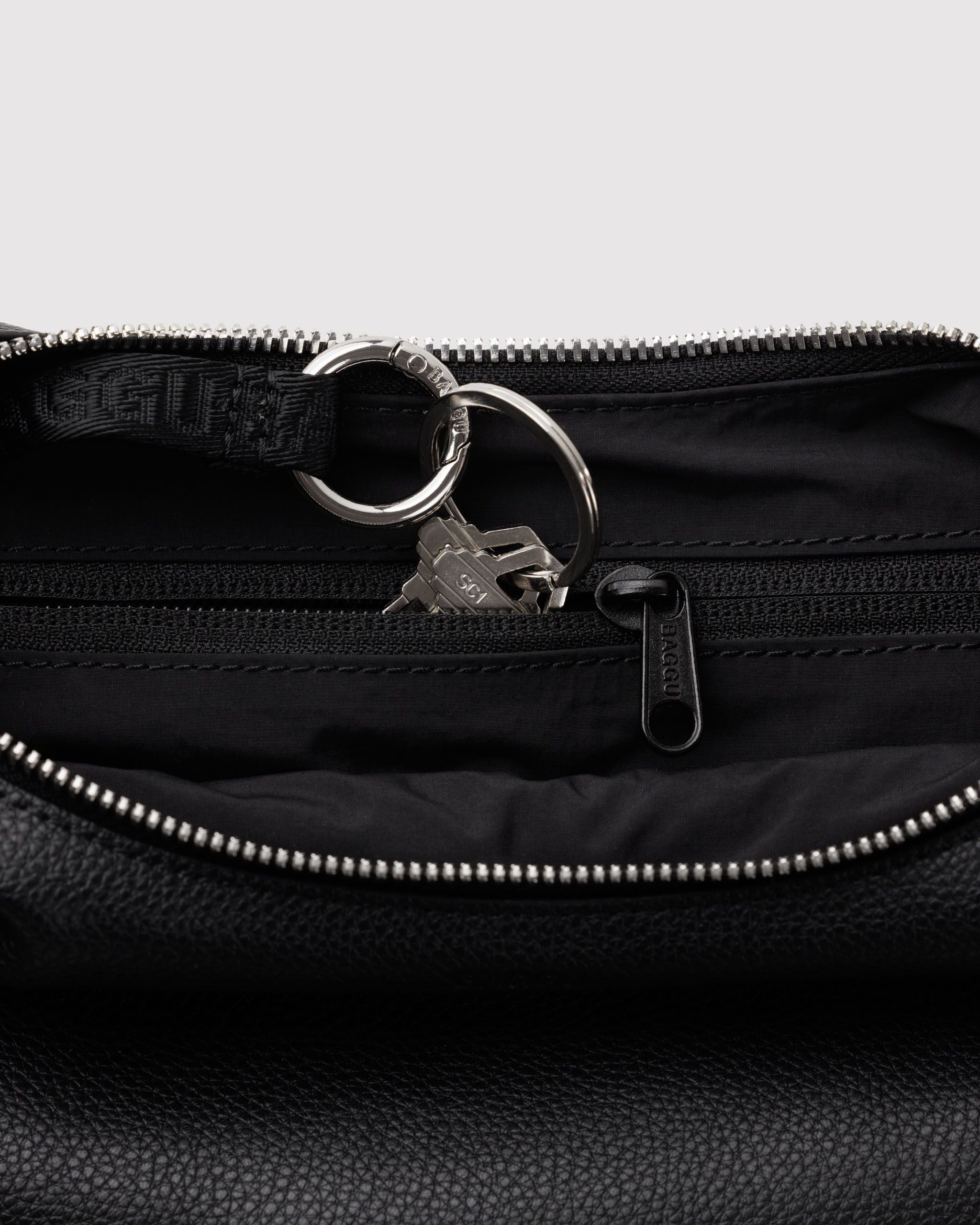 Small Recycled Leather Flat Crescent in Black for Easy Everyday Style